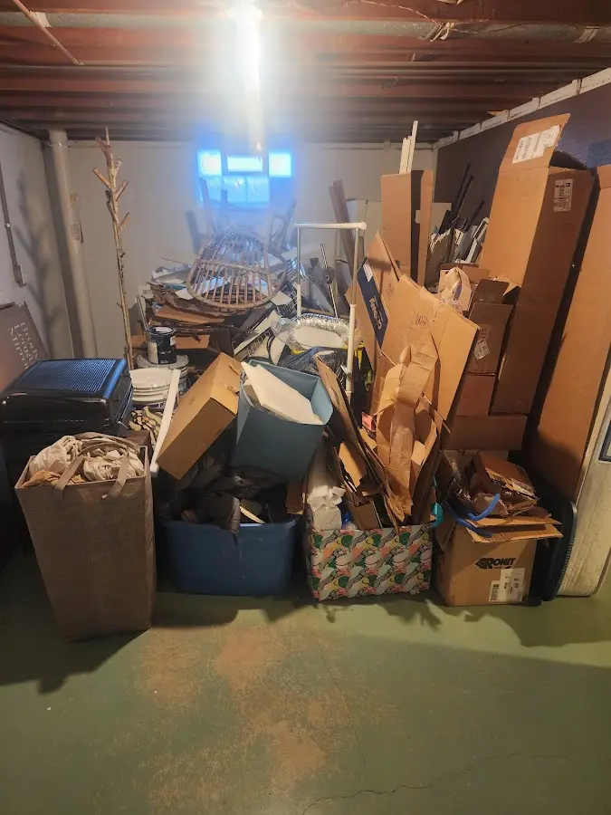 Roll-off dumpster container at job site for Construction Dumpster Rental in Belfast